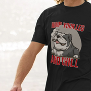 Black funny dog t-shirt with a british bulldog graphic and text 'Hump Your Leg And Chill' on a white background