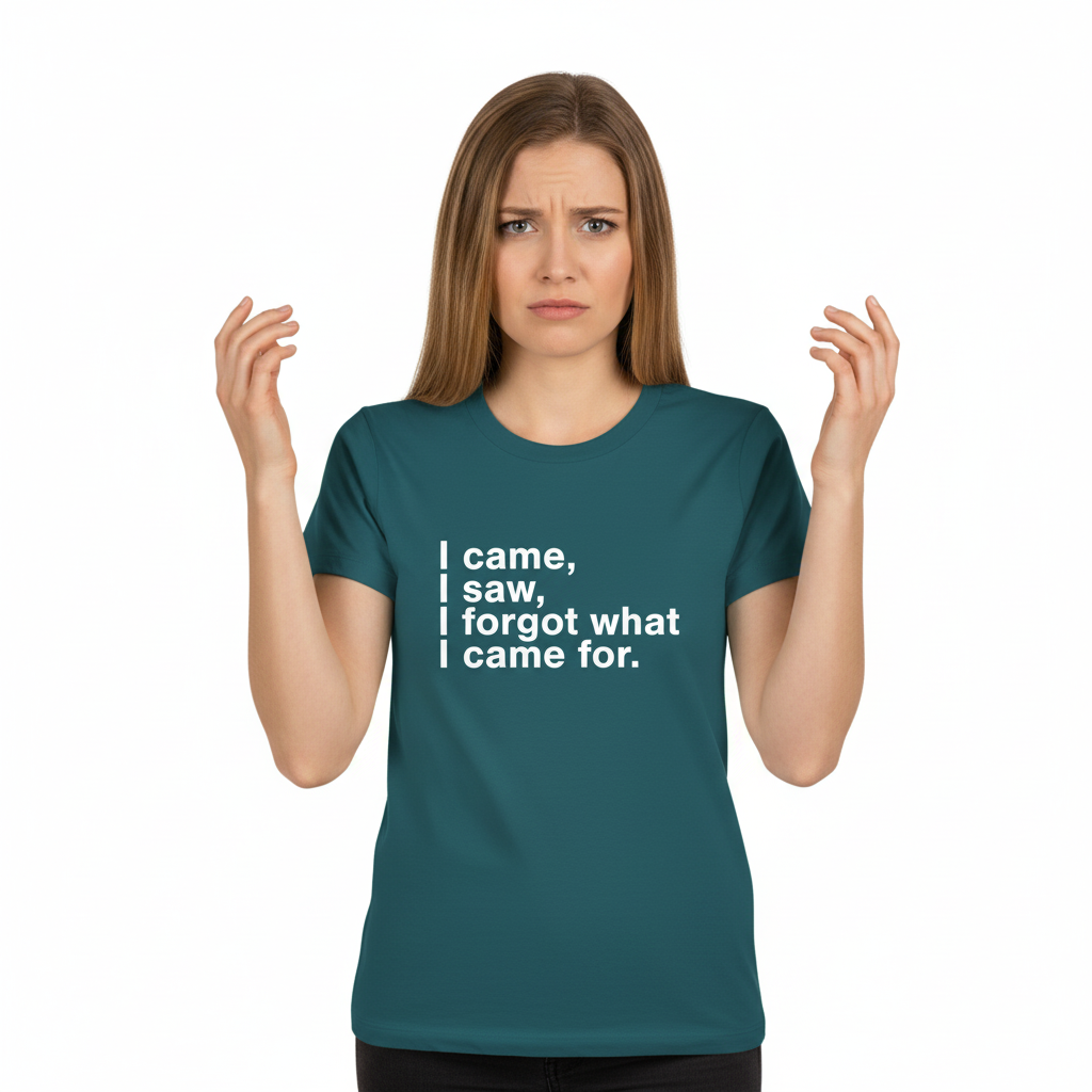 Woman wearing a teal t-shirt with humorous text design on a white background
