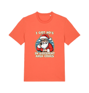 orange christmas t-shirt with the graphic of santa claus on the telephone and the slogan 'i got ho's in different area codes'