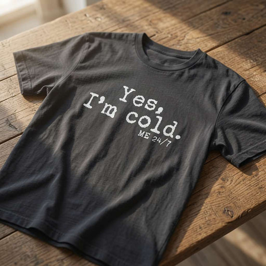 Black Yes, I’m Cold. ME 24/7 t-shirt on wood, funny witty mens slogan
