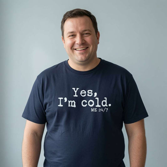 Man smiling in navy Yes, I’m Cold. ME 24/7 t-shirt, mens funny cheeky slogan