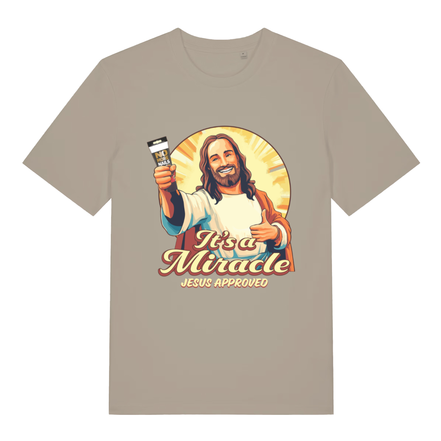 Beige It’s A Miracle funny graphic t-shirt with Jesus holding No More Nails tube and “It’s a Miracle Jesus Approved” text  