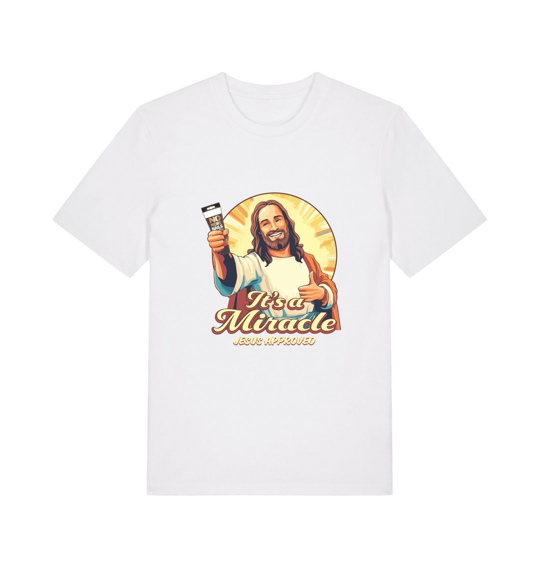 white funny jesus t-shirt with the graphic of jesus holding a tube of no more nails and the slogan 'it's a miracle jesus approved'