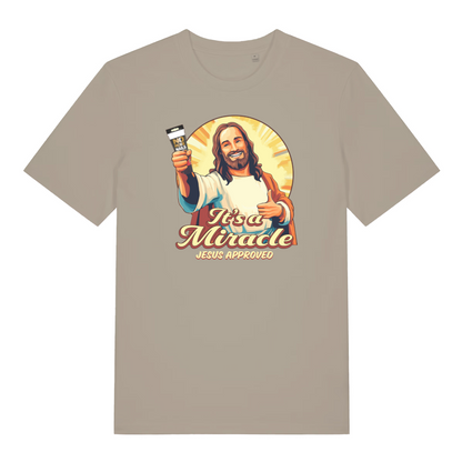 stone funny jesus t-shirt with the graphic of jesus holding a tube of no more nails and the slogan 'it's a miracle jesus approved'