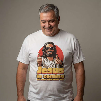 Grey-haired man smiling looking down in white Jesus is Coming All Over Your Mum’s Tits t-shirt featuring cool sunglasses Jesus, witty crude rude jesus graphic