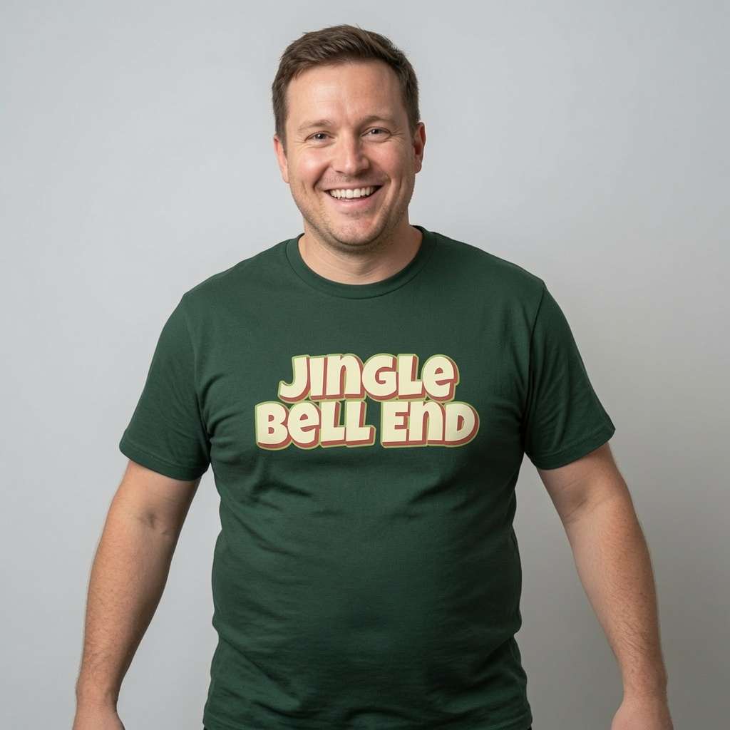 Man smiling with arms slightly out in green Jingle Bell End tee, mens funny xmas day slogan