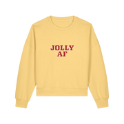 yellow xmas sweater with the slogan 'jolly af'