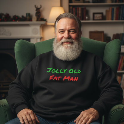 Man wearing a black sweater with 'Jolly Old Fat Man' text, sitting in a green armchair.