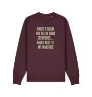 red brown christmas slogan sweater with 'there's room for all of gods creatures right next to my roasties'