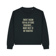 black christmas sweater with the slogan 'there's room for all of gods creatures next to my roasties'