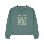 green christmas sweater with the slogan 'there's room for all of gods creatures next to my roasties'