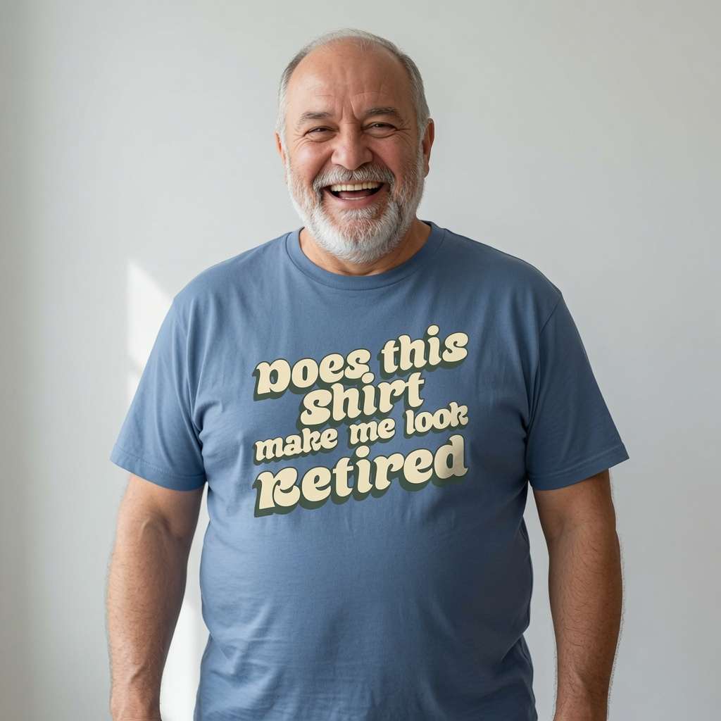 Older man laughing in blue Does This Shirt Make Me Look Retired t-shirt, mens funny retirement slogan