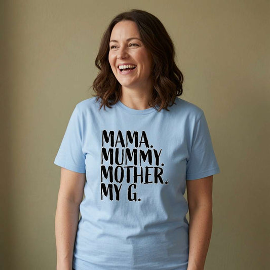 Woman laughing in light blue Mama Mummy Mother My G tee, ladies witty relatable mum slogan