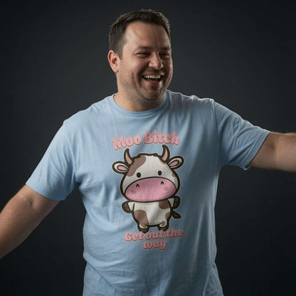 Man laughing with arms out in sky blue Moo Bitch Get Out the Way t-shirt featuring cartoon cow, fun cheeky music inspired mens cow pun graphic