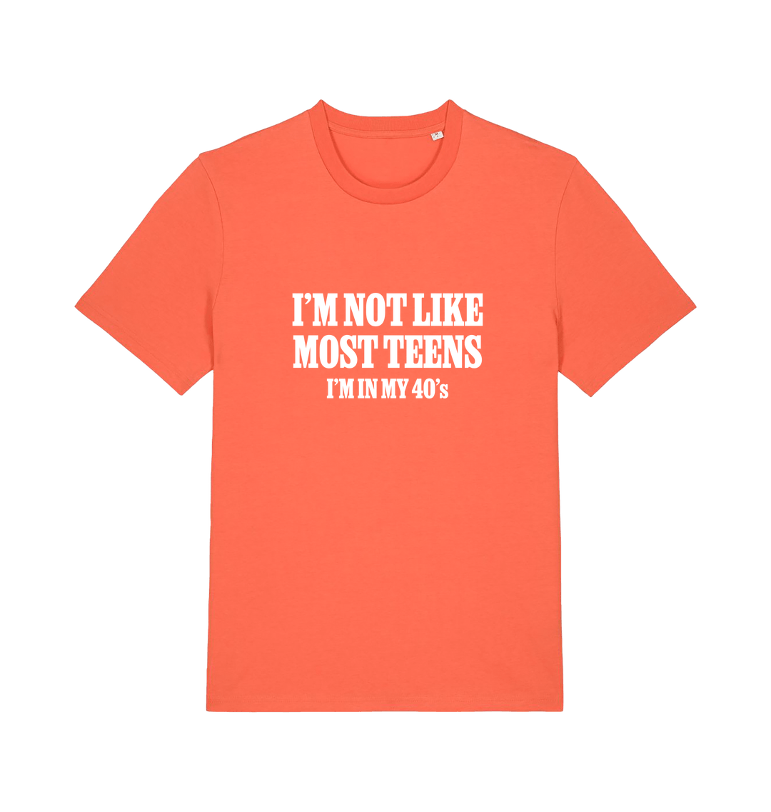 orange funny slogan t-shirt with 'i'm not like most teens im in my 40's'