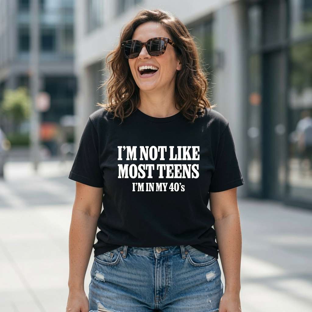 Woman laughing with sunglasses in black I’m Not Like Most Teens I’m In My 40’s tee, fun ladies relatable slogan