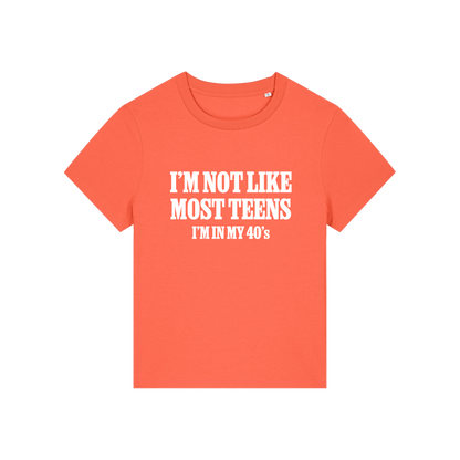 orange slogan t-shirt that reads 'i'm not like most teens i'm in my 40's'