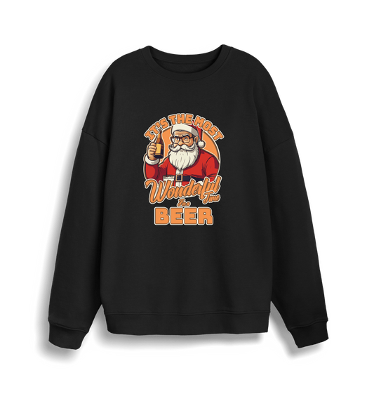 black xmas sweater with the graphic of santa drinking a beer and the slogan 'it's the most wonderful time for a beer'