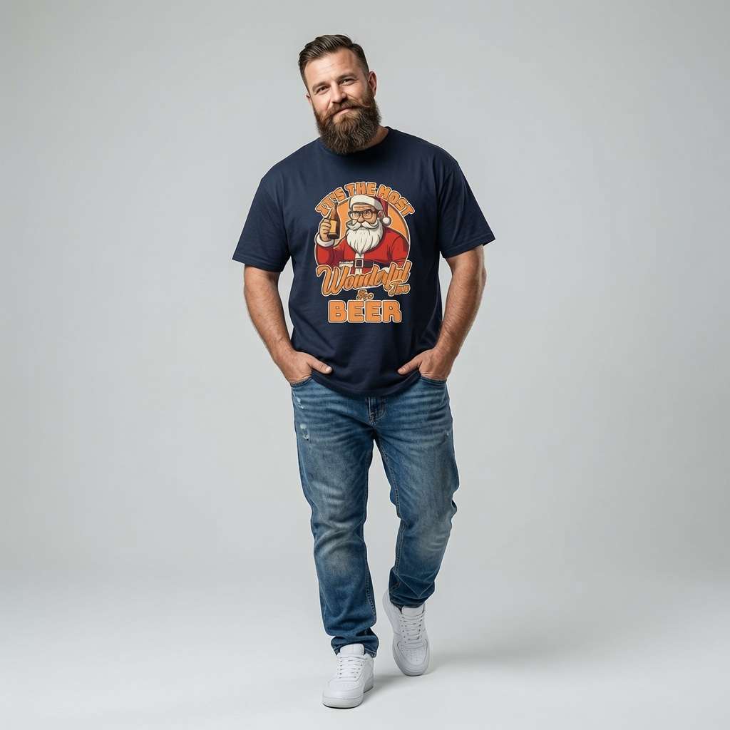 Bearded man with hands in pockets in navy It’s the Most Wonderful Time for a Beer t-shirt featuring Santa with beer, funny witty santa beer pun xmas day