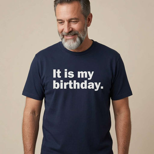 Bearded man smiling looking down in navy It is my birthday. t-shirt, witty mens the greatest birthday gift slogan