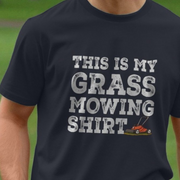 Black gardening t-shirt with 'This is my grass mowing shirt' slogan and lawn mower graphic on a green background