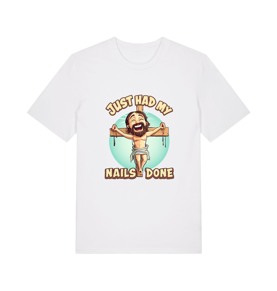 white funny jesus t-shirt with a graphic of a cartoon jesus on a cross and the slogan 'just had my nails done'