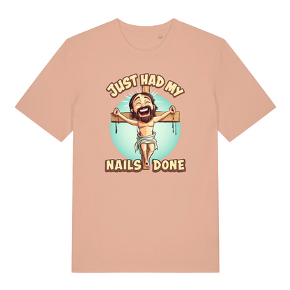 peach women's funny offensive t-shirt with the graphic of jesus on the cross and the slogan 'just had my nails done'