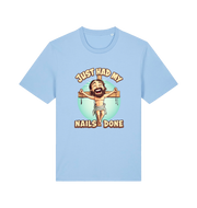 light blue funny jesus t-shirt with the graphic of a cartoon jesus on the cross and the slogan 'just had my nails done'