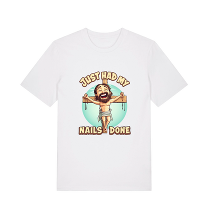 white funny jesus t-shirt with the graphic of a cartoon jesus on the cross and the slogan 'just had my nails done'