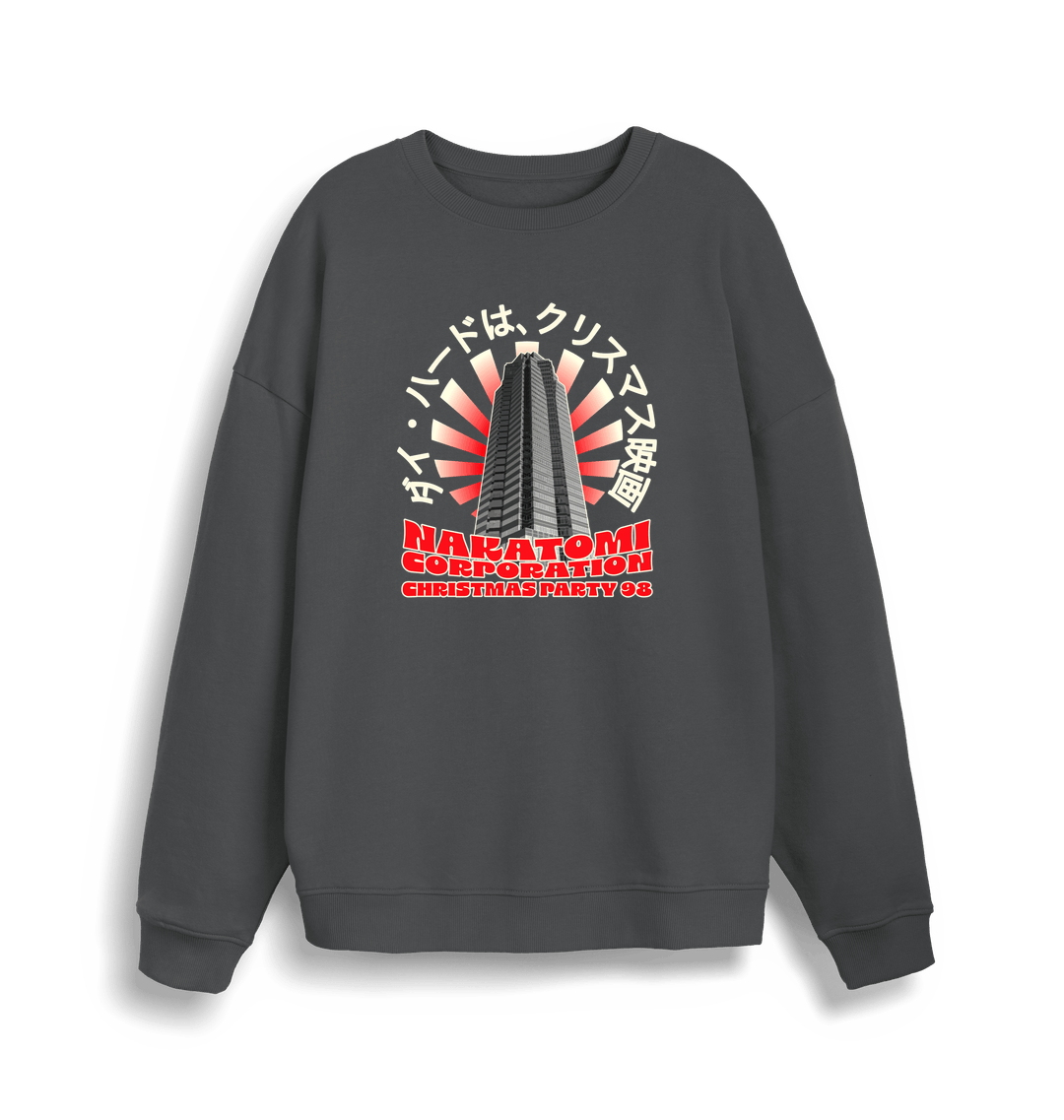 grey christmas sweater with the graphic of a sky scraper and the slogan nakatomi corporation christmas party'