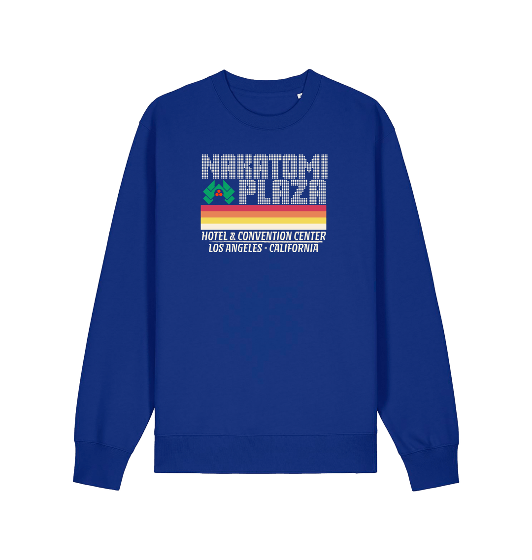 blue christmas sweater with a retro design and the slogan 'nakatomi plaza hotel and convention centre'