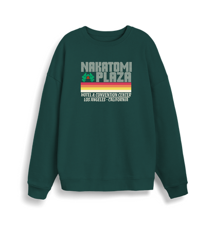 green christmas sweater with a retro design and the slogan 'nakatomi plaza hotel and convention centre'