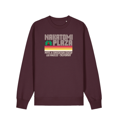 red brown christmas sweater with a retro design and the slogan 'nakatomi plaza hotel and convention centre'