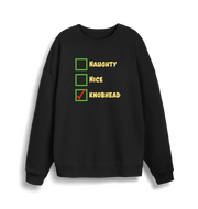 black christmas sweater with the slogan 'naughty nice knobhead'
