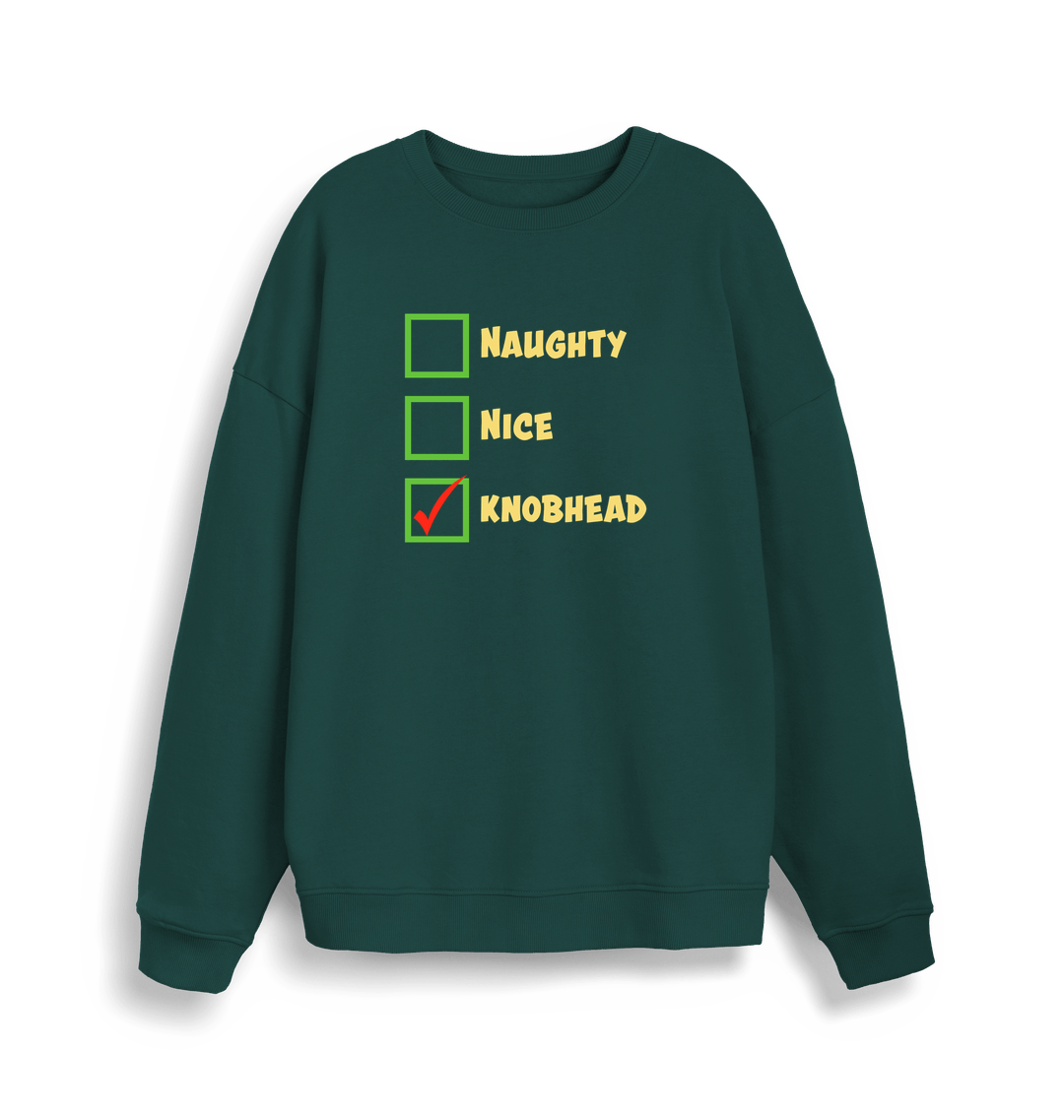 green christmas sweater with the slogan 'naughty nice knobhead'
