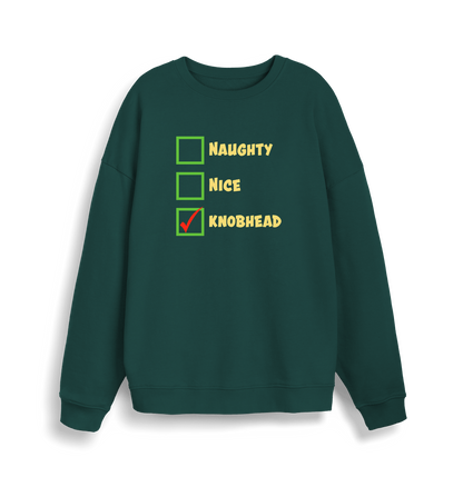 green christmas sweater with the slogan 'naughty nice knobhead'