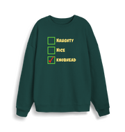 green christmas sweater with the slogan 'naughty nice knobhead'