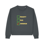 grey christmas sweater with the slogan 'naughty nice knobhead'