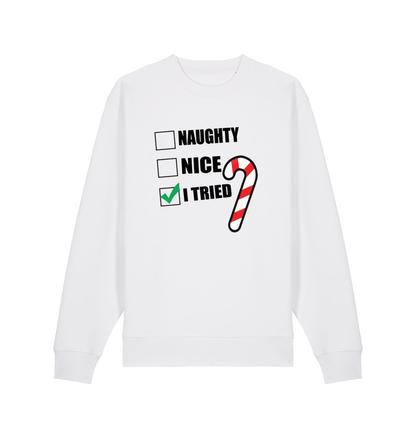 white christmas sweater with the slogan 'naughty nice i tried'