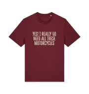 burgundy slogan t-shirt that reads 'yes i do really need all these motocycles'