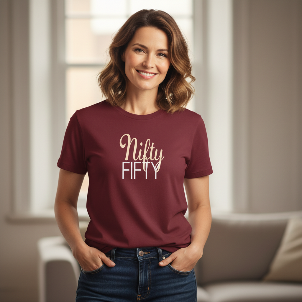 Woman wearing a maroon t-shirt with 'Nifty Fifty' text in a living room.