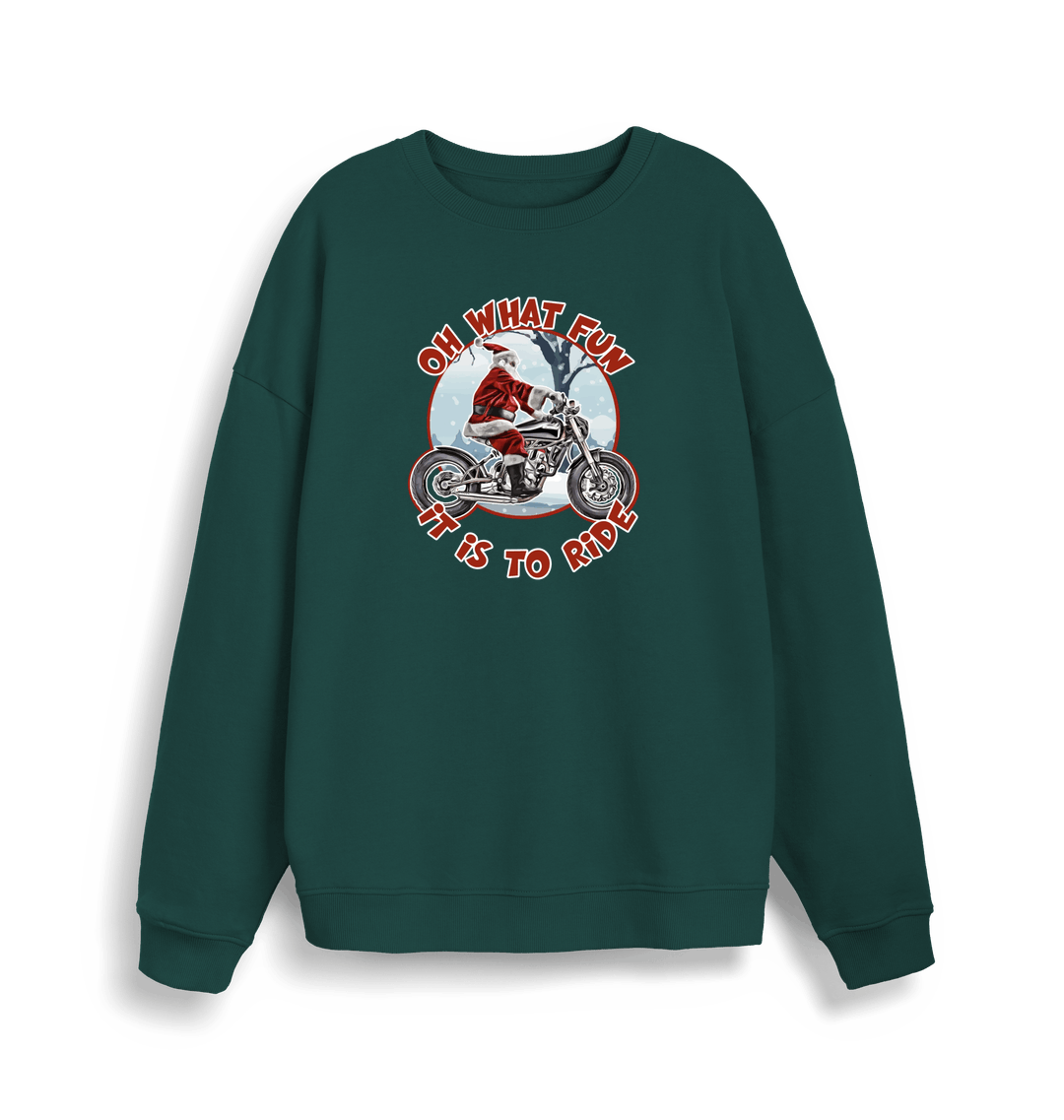 green christmas sweater with the graphic of santa riding a motorbike and the slogan 'oh what fun it is to ride'
