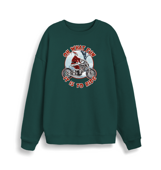 green christmas sweater with the graphic of santa riding a motorbike and the slogan 'oh what fun it is to ride'