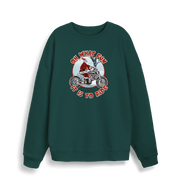 green christmas sweater with the graphic of santa riding a motorbike and the slogan 'oh what fun it is to ride'