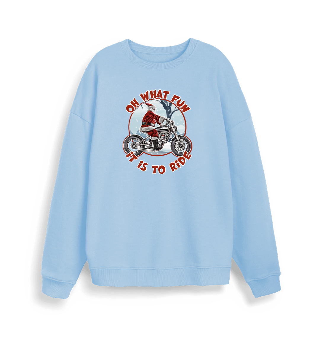light blue christmas sweater with the graphic of santa riding a motorbike and the slogan 'oh what fun it is to ride'