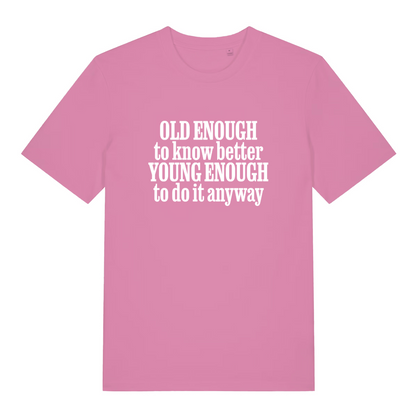 pink women's funny slogan tee with the text 'old enough to know better young enough to do it anyway'