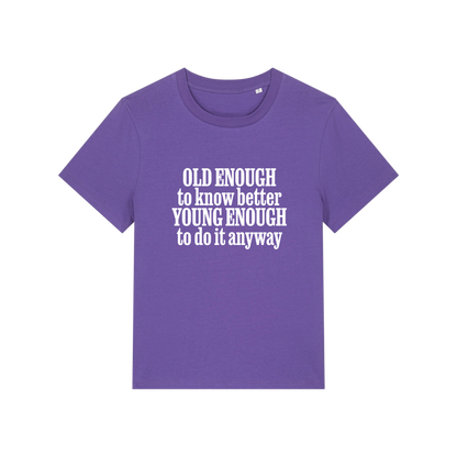 purple funny slogan t-shirt that reads 'old enough to know better, young enough to do it anyway'