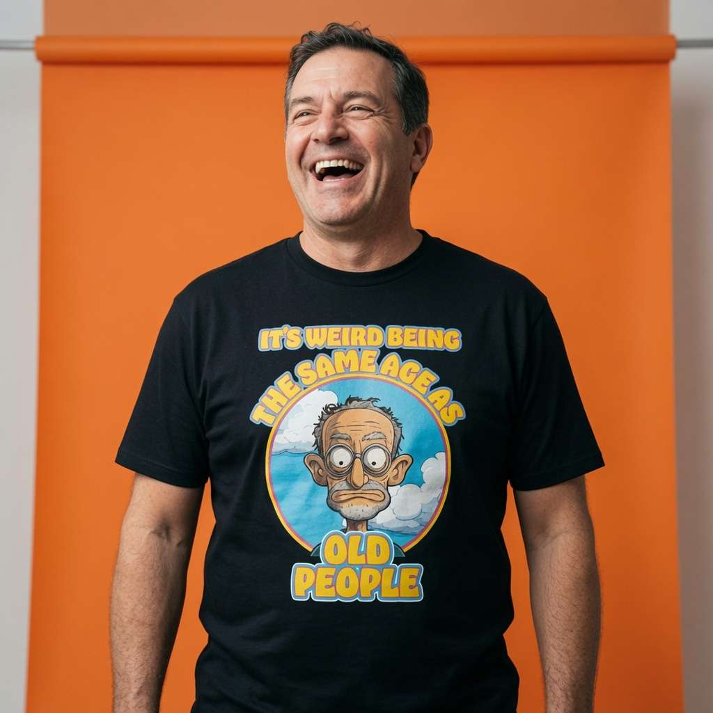 Man laughing while wearing a black It’s Weird Being The Same Age As Old People t-shirt, funny mens cheeky grandad graphic design that every cheeky lad will claim