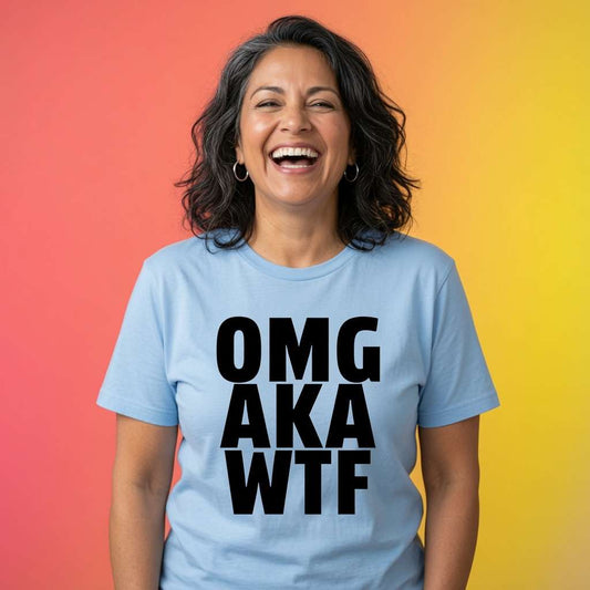Woman laughing while wearing a light blue OMG AKA WTF t-shirt, witty ladies cheeky meme slogan design full of pure attitude