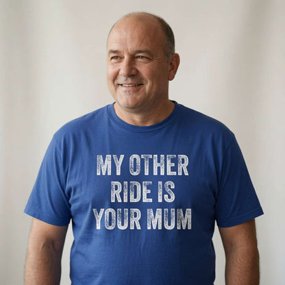 Bald man smiling calmly in a blue My Other Ride Is Your Mum t-shirt, witty and rude dad slogan perfect for the ultimate cheeky gift